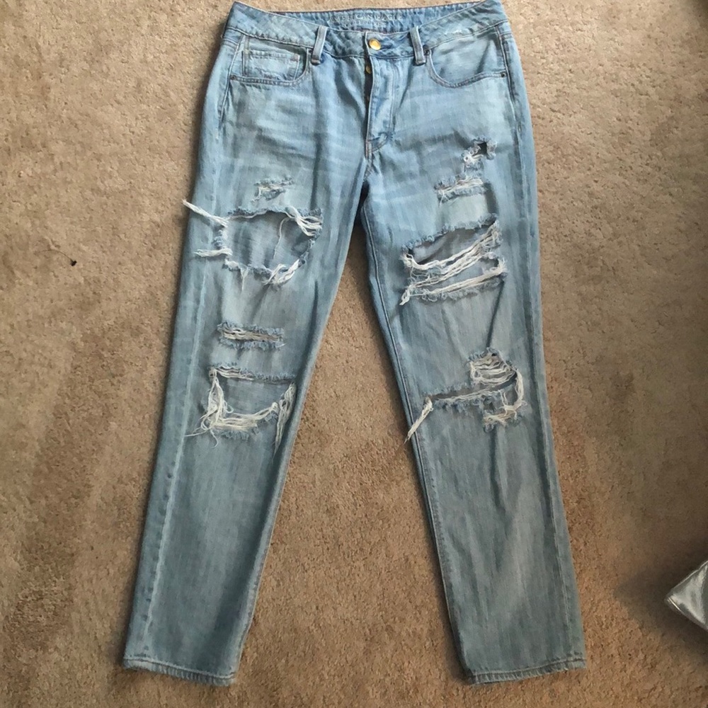 Light wash “mom” style jeans with rips